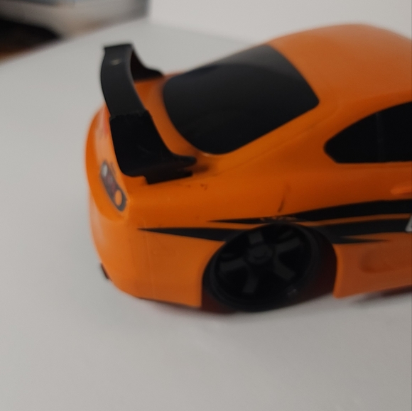 Jada Toys JDM Tuners Orange 1995 Toyota Supra R/C - Picture 5 of 9